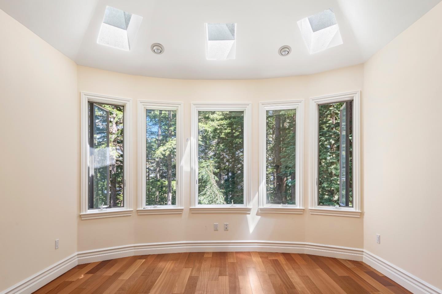 1 Reids Roost Road Woodside, CA 94062 - Photo 10 of 24 a view of room with window and hardwood floor
