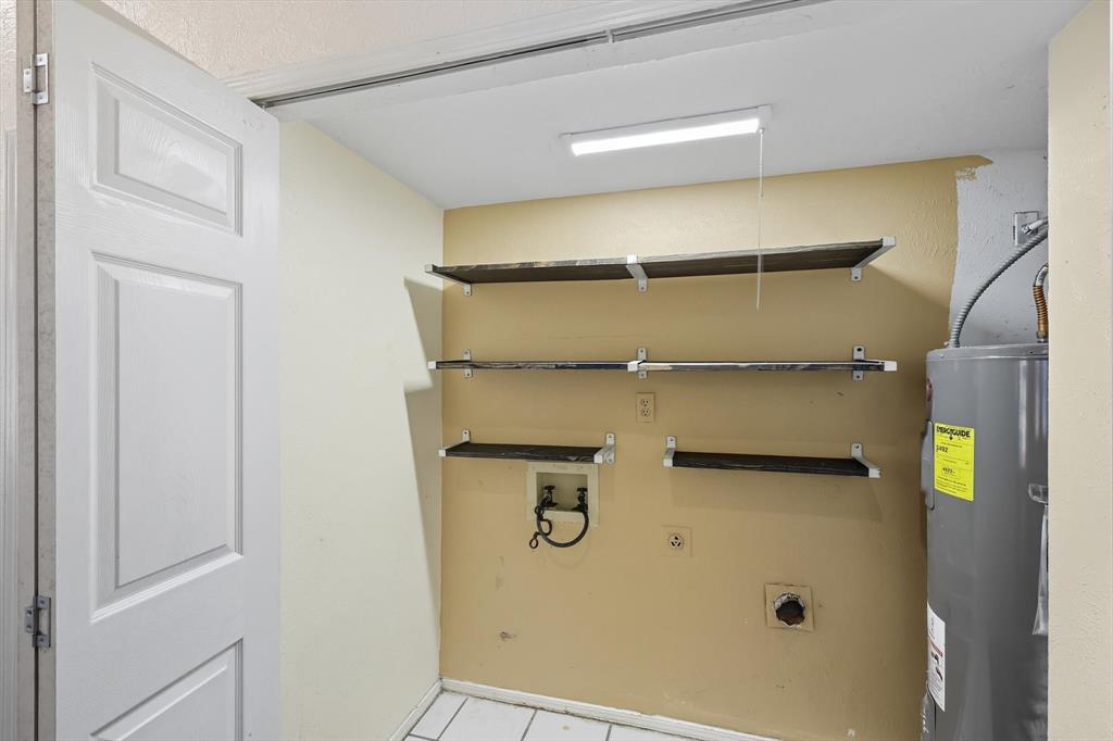 9101 Denver Street Rowlett, TX 75088 - Photo 20 of 40 a close up of a shower