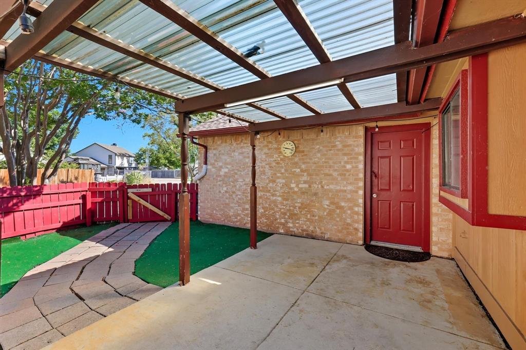 9101 Denver Street Rowlett, TX 75088 - Photo 29 of 40 a view of a backyard with a small cabin