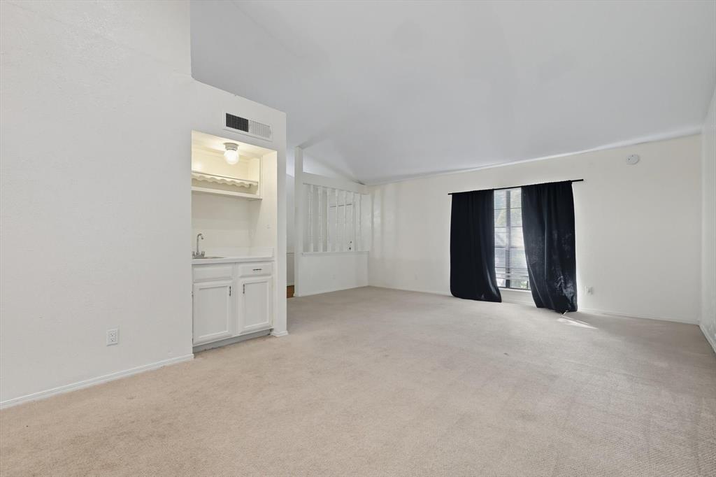 9101 Denver Street Rowlett, TX 75088 - Photo 8 of 40 an empty room with windows and closet