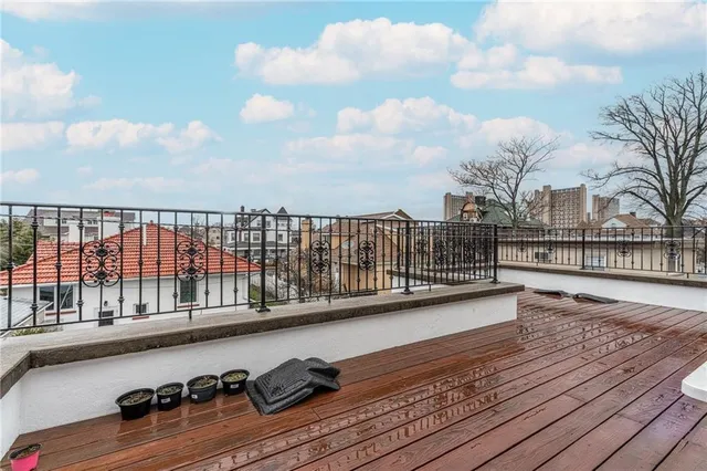a view of balcony with furniture