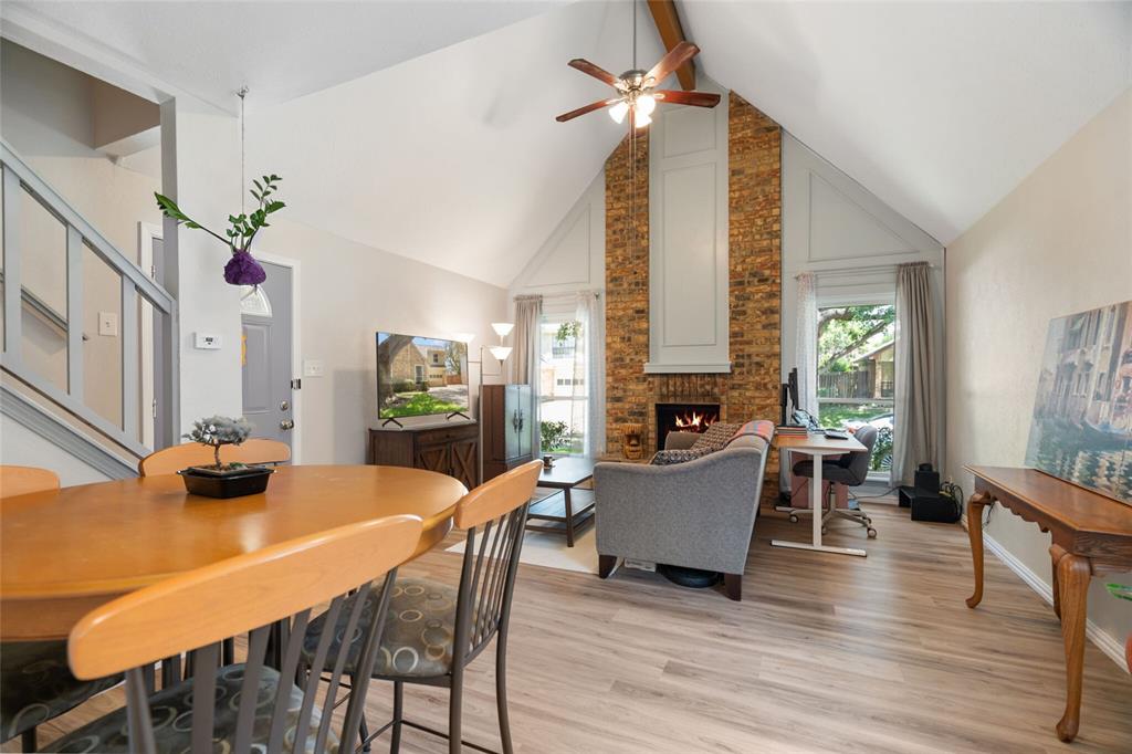 2960 Harbinger Lane Dallas, TX 75287 - Photo 11 of 25 a view of a dining room with furniture and wooden floor