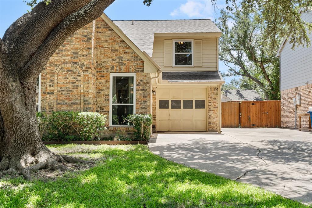 2960 Harbinger Lane Dallas, TX 75287 - Photo 2 of 25 front view of a house with a yard