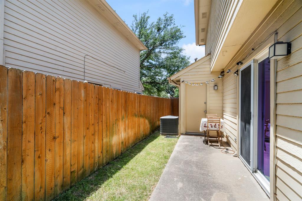 2960 Harbinger Lane Dallas, TX 75287 - Photo 24 of 25 a backyard of a house with outdoor seating