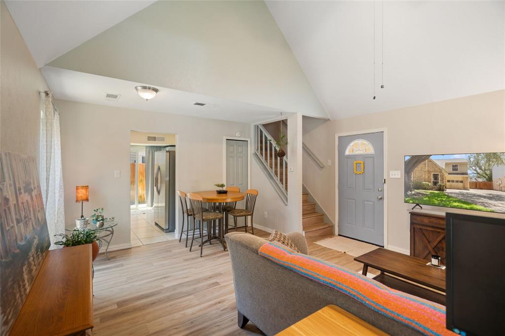 2960 Harbinger Lane Dallas, TX 75287 - Photo 10 of 25 a room with furniture and wooden floor