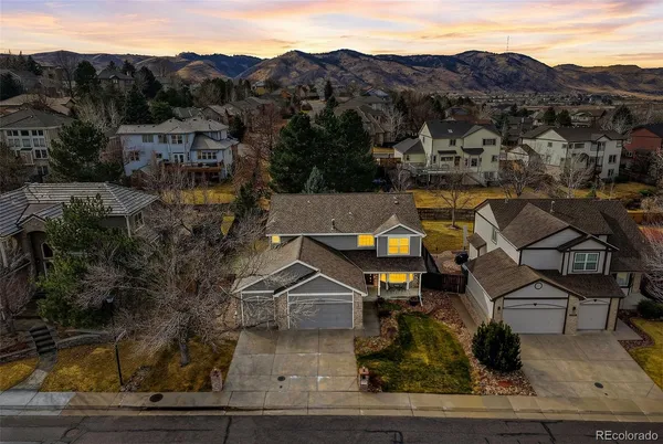 an aerial view of a house with a garden