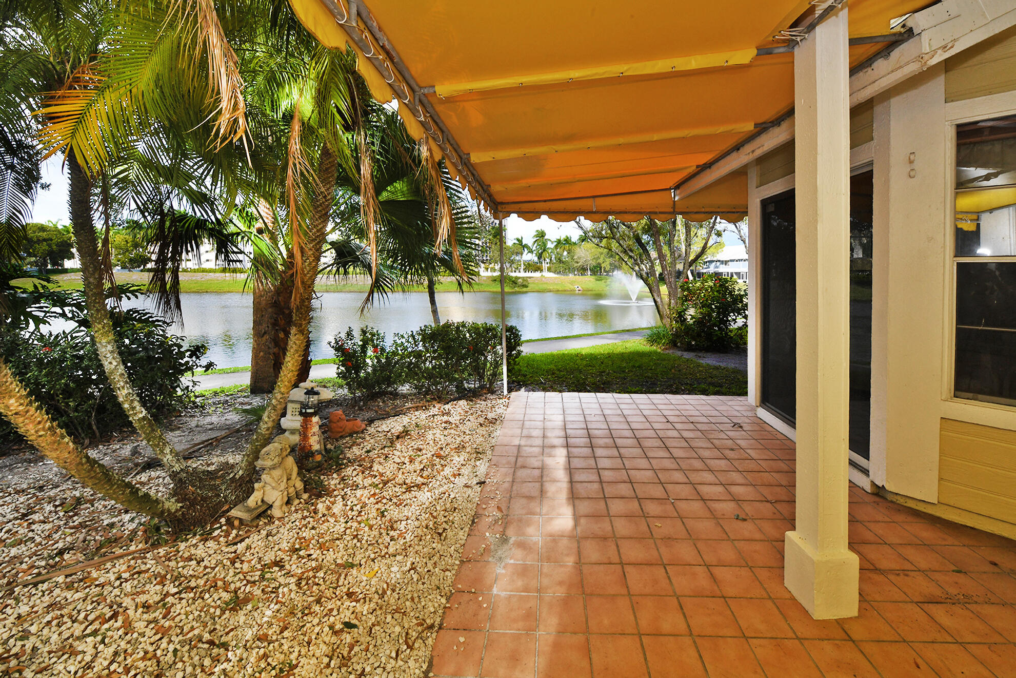 5135 Pointe Alexis Boca Raton, FL 33431 - Photo 32 of 35 a view of a pathway with a yard