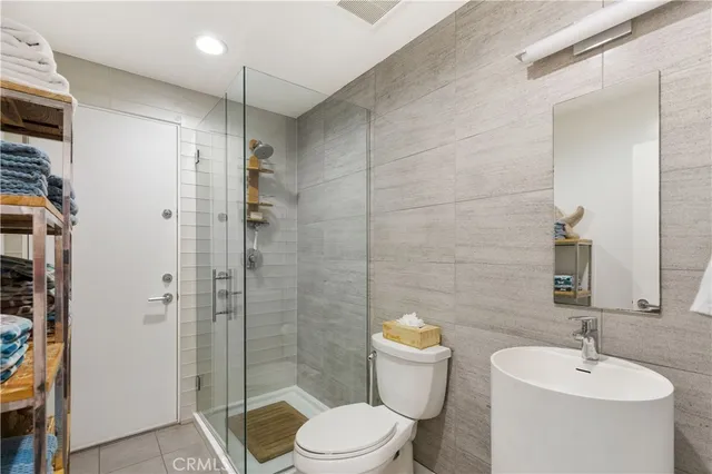 an aerial view of a building with parking