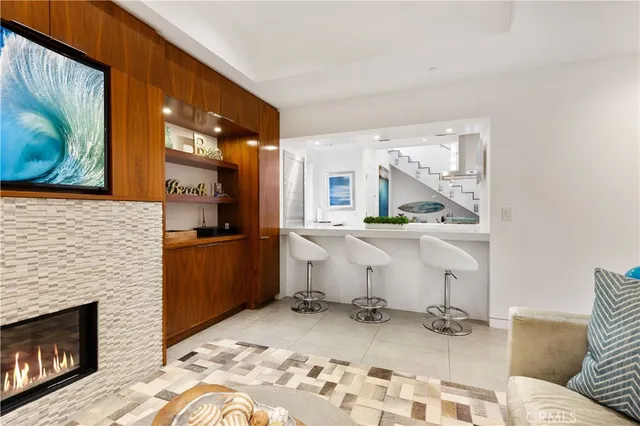 a living room with a couch and a fireplace