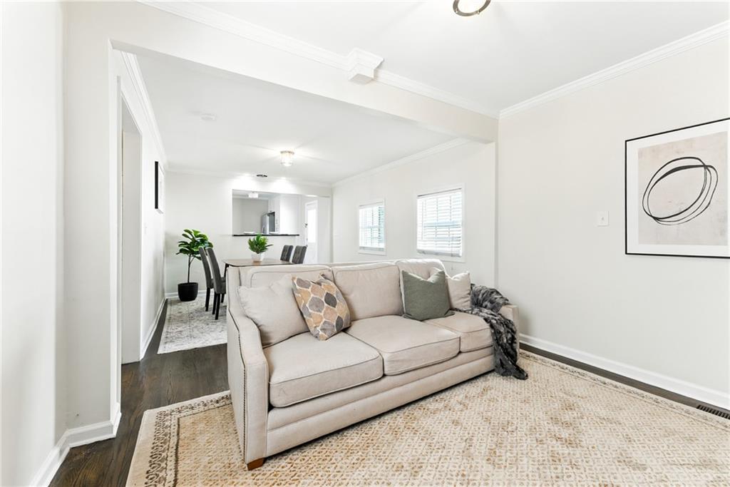 1411 Mercer Avenue Atlanta, GA 30337 - Photo 11 of 21 a living room with furniture and a potted plant