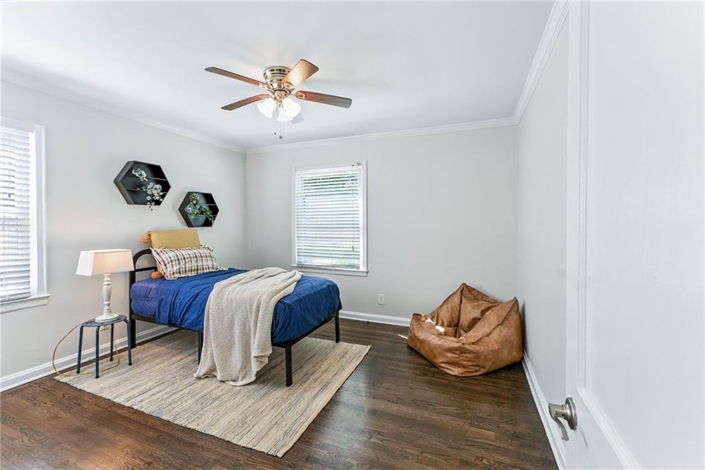 1411 Mercer Avenue Atlanta, GA 30337 - Photo 17 of 21 a bedroom with furniture and a window