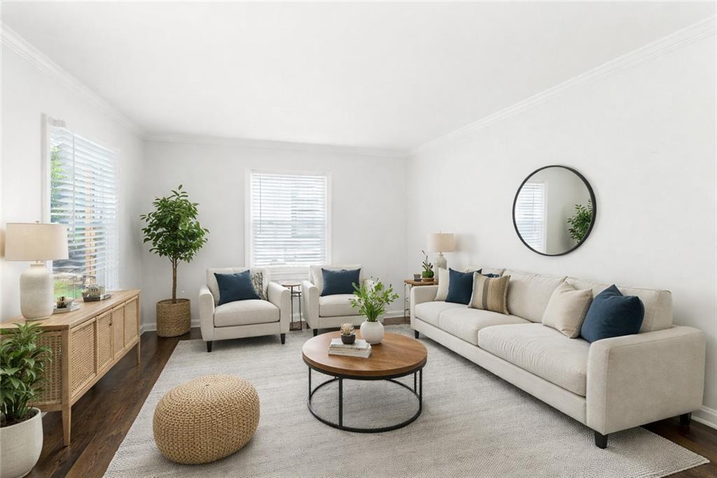 1411 Mercer Avenue Atlanta, GA 30337 - Photo 4 of 21 a living room with furniture and a large window