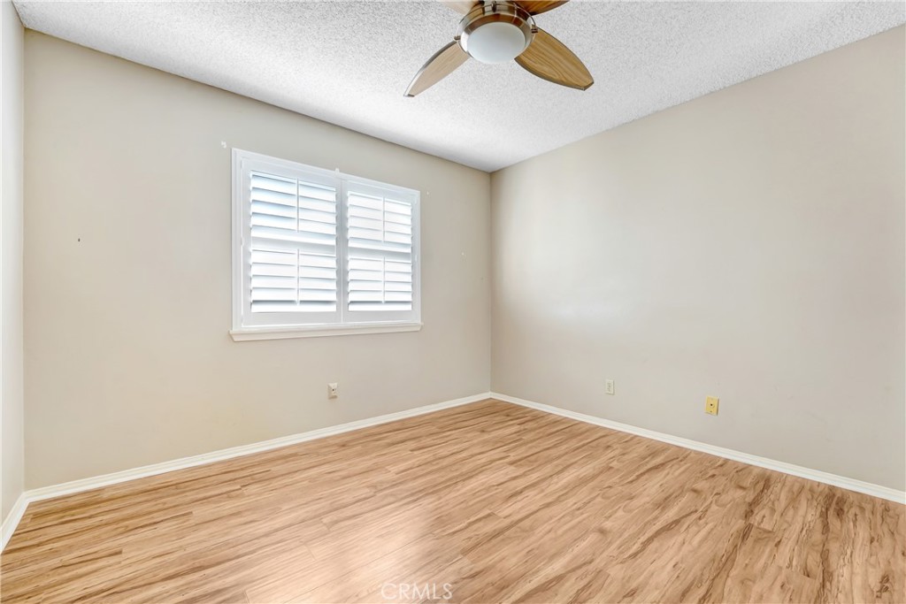 5514 Las Virgenes Road Calabasas, CA 91302 - Photo 16 of 20 a view of a room with wooden floor and windows