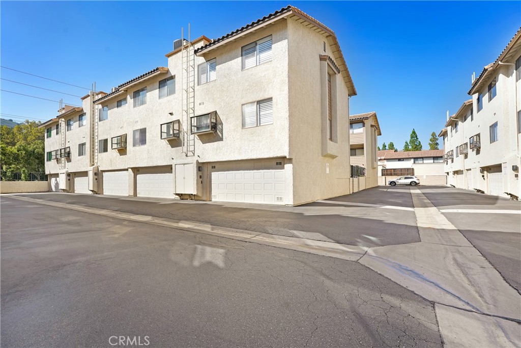 5514 Las Virgenes Road Calabasas, CA 91302 - Photo 19 of 20 a view of a building along the street