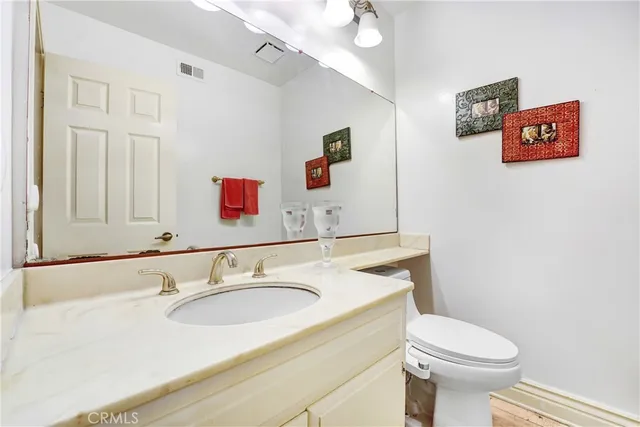 a bathroom with a sink and a toilet