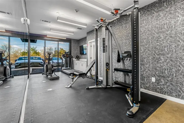 a view of a room with gym equipment
