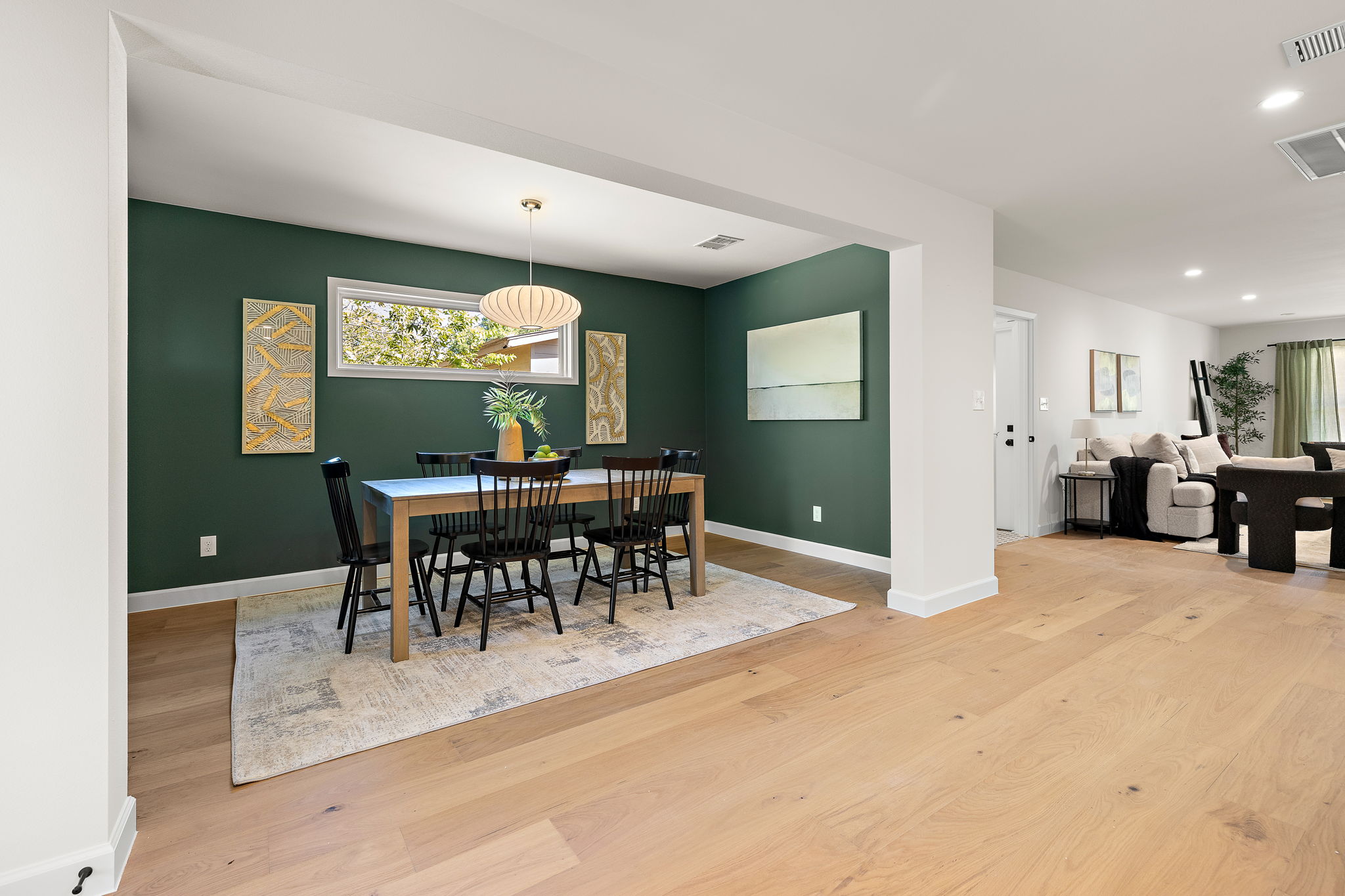 8102 Burrell Drive Austin, TX 78757 - Photo 14 of 31 a view of a a dining room with furniture and a chandelier