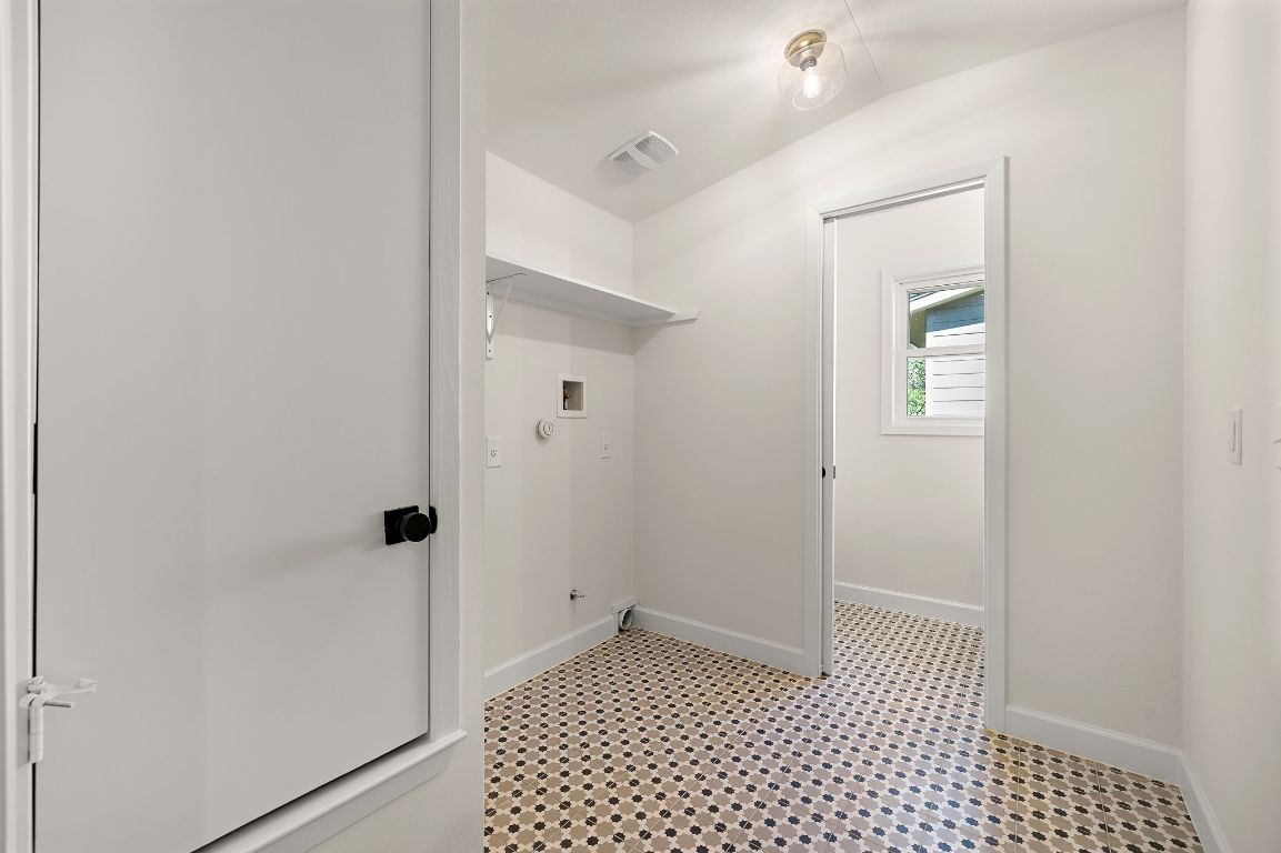 8102 Burrell Drive Austin, TX 78757 - Photo 25 of 31 a view of a bathroom with a sink