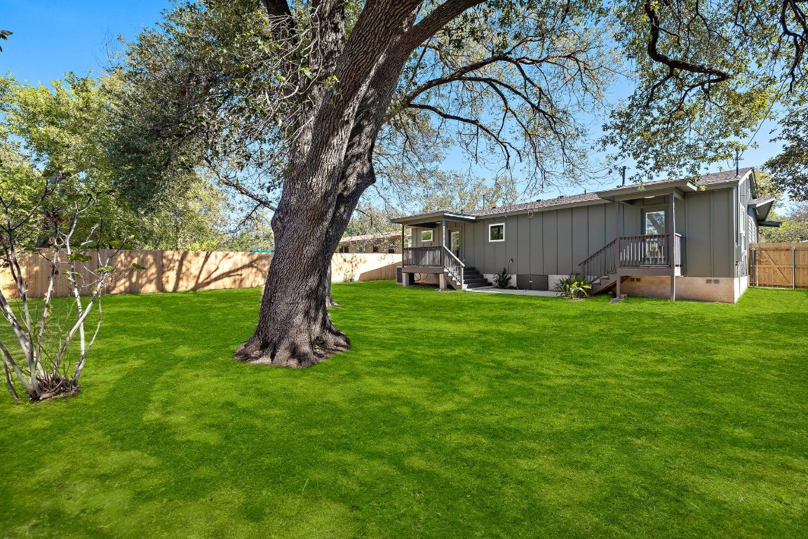 8102 Burrell Drive Austin, TX 78757 - Photo 29 of 31 a view of a backyard with a garden