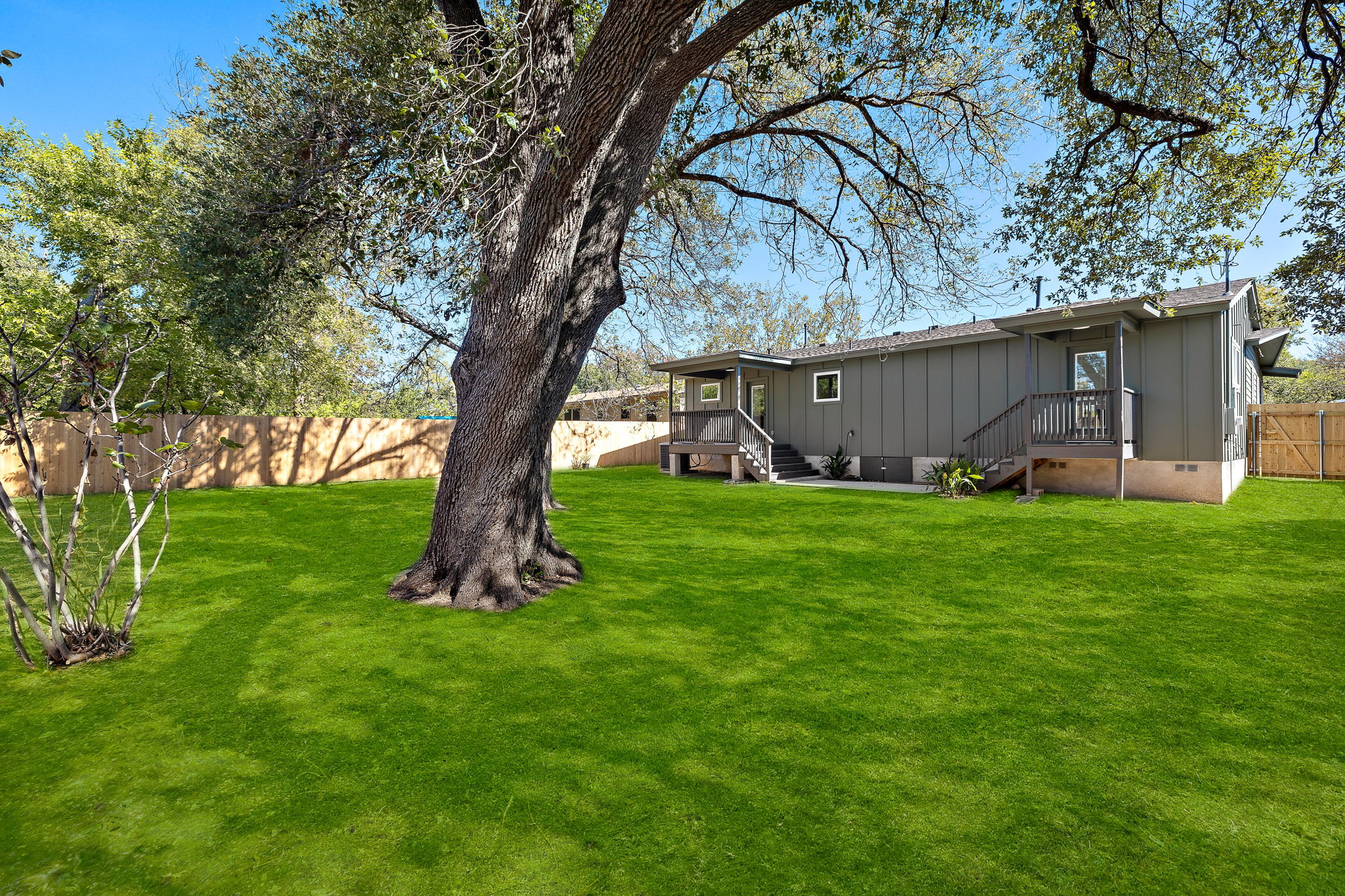 8102 Burrell Drive Austin, TX 78757 - Photo 29 of 31 a view of a backyard with a garden