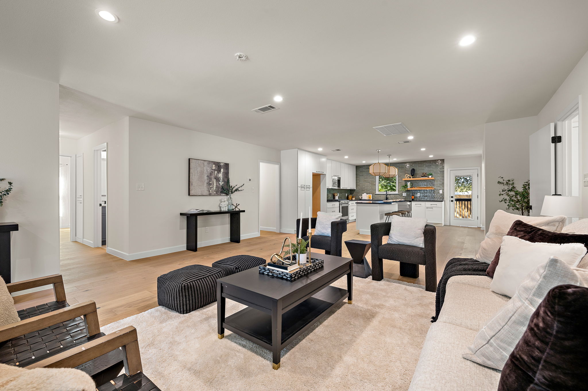 8102 Burrell Drive Austin, TX 78757 - Photo 5 of 31 a living room with furniture kitchen view and a table