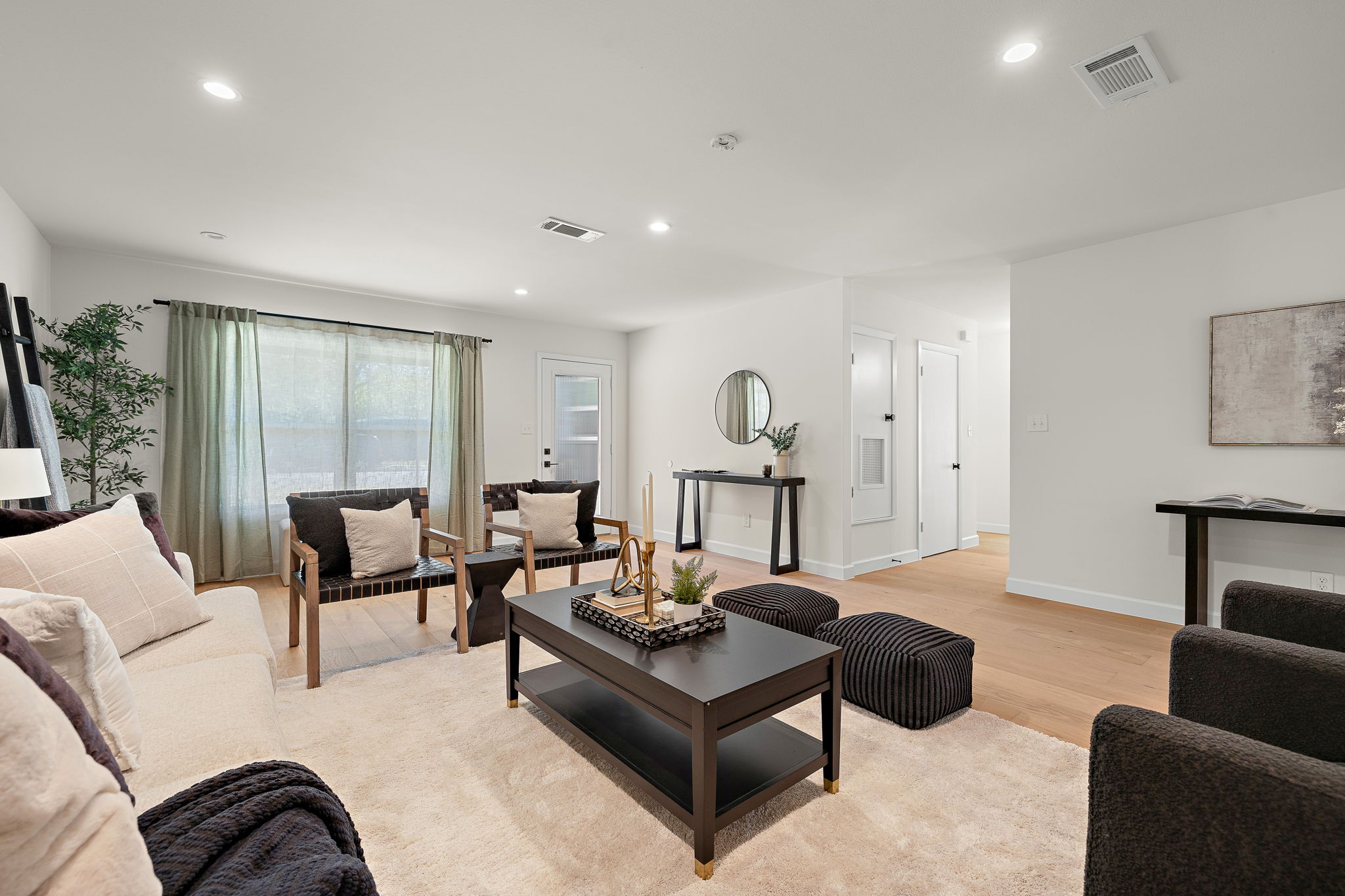 8102 Burrell Drive Austin, TX 78757 - Photo 7 of 31 a living room with furniture and a large window