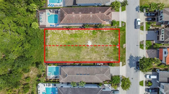 an aerial view of a house with a garden