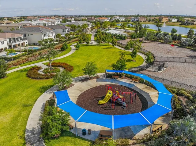 an aerial view of a pool patio swimming pool and outdoor seating