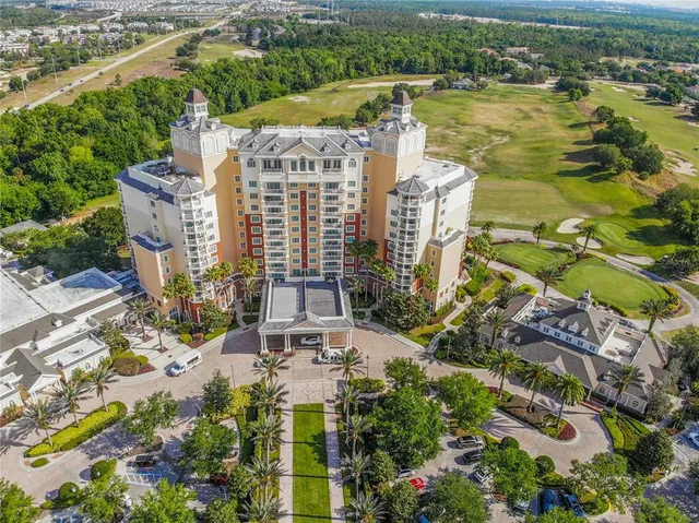 a view of a lake with a city skyline in the background