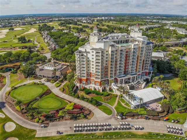 a view of a swimming pool with a table and chairs