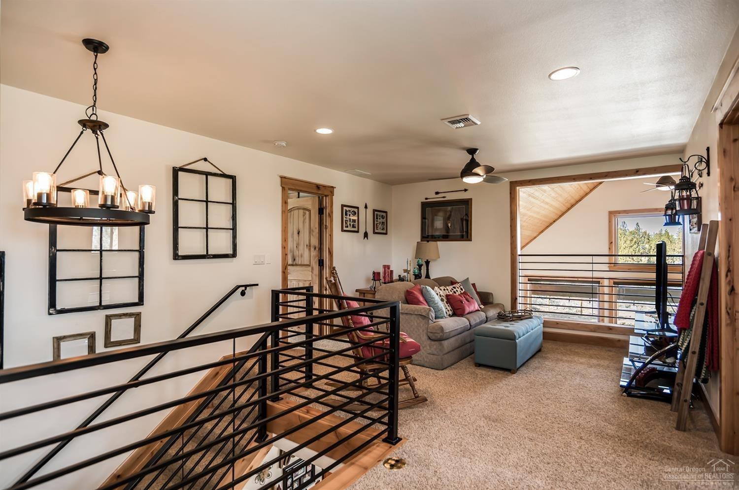 22017 Quebec Court Bend, OR 97702 - Photo 15 of 25 Upstairs landing/tv room