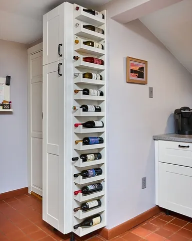 a view of bedroom with a bed and a cabinet