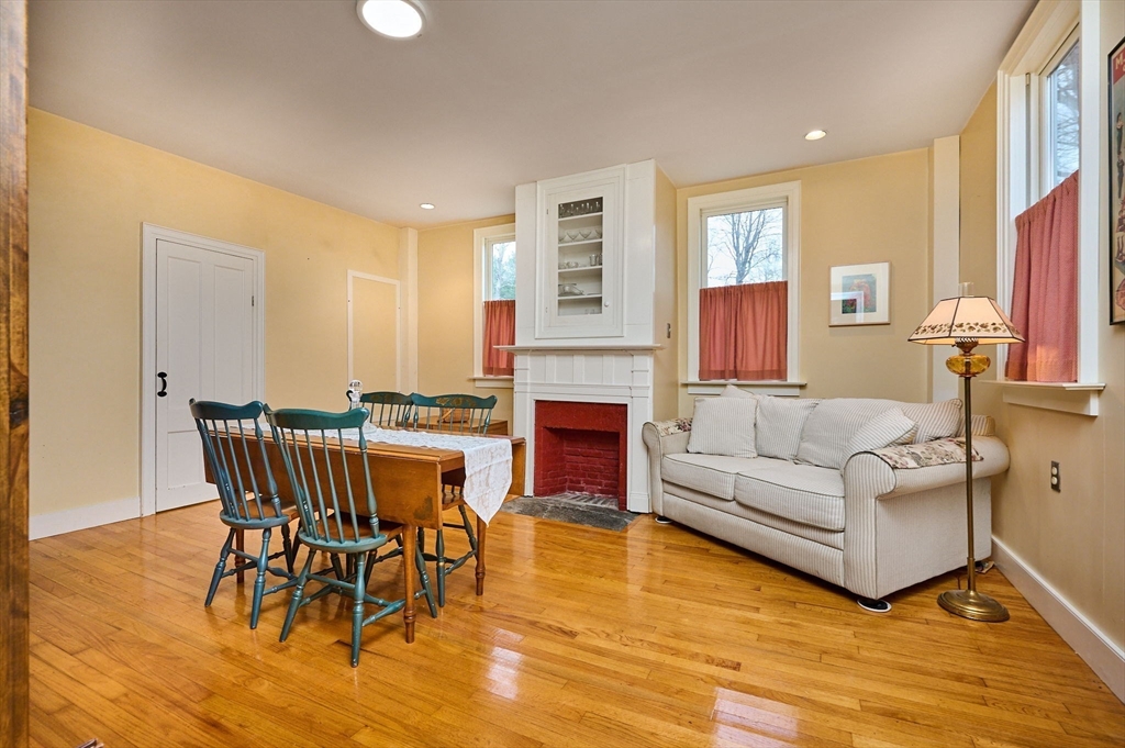 10 Maple Street Plainfield, MA 01070 - Photo 19 of 42 a living room with furniture and a fireplace
