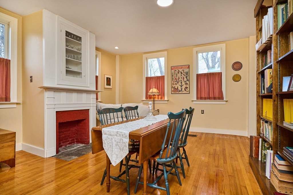 10 Maple Street Plainfield, MA 01070 - Photo 20 of 42 a view of a livingroom with furniture and a fireplace