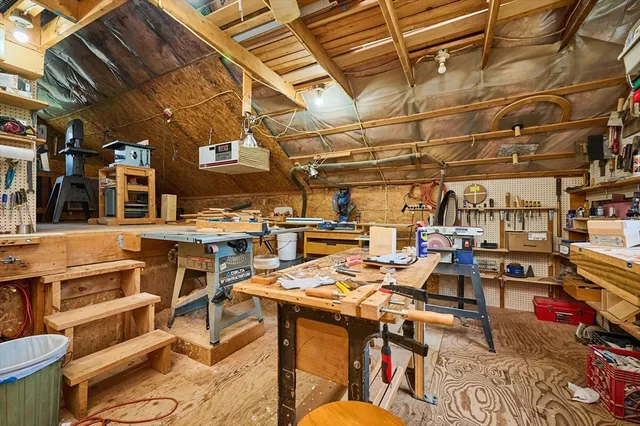 a view of a chairs and table in a patio