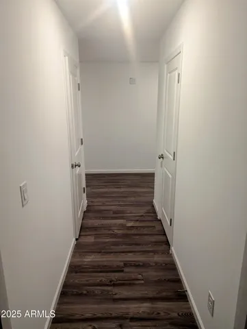 a view of a kitchen counter space a sink stainless steel appliances and cabinets