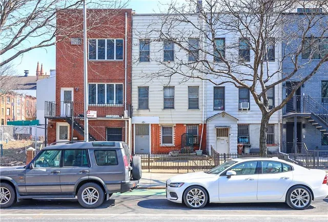 a car parked in front of a building