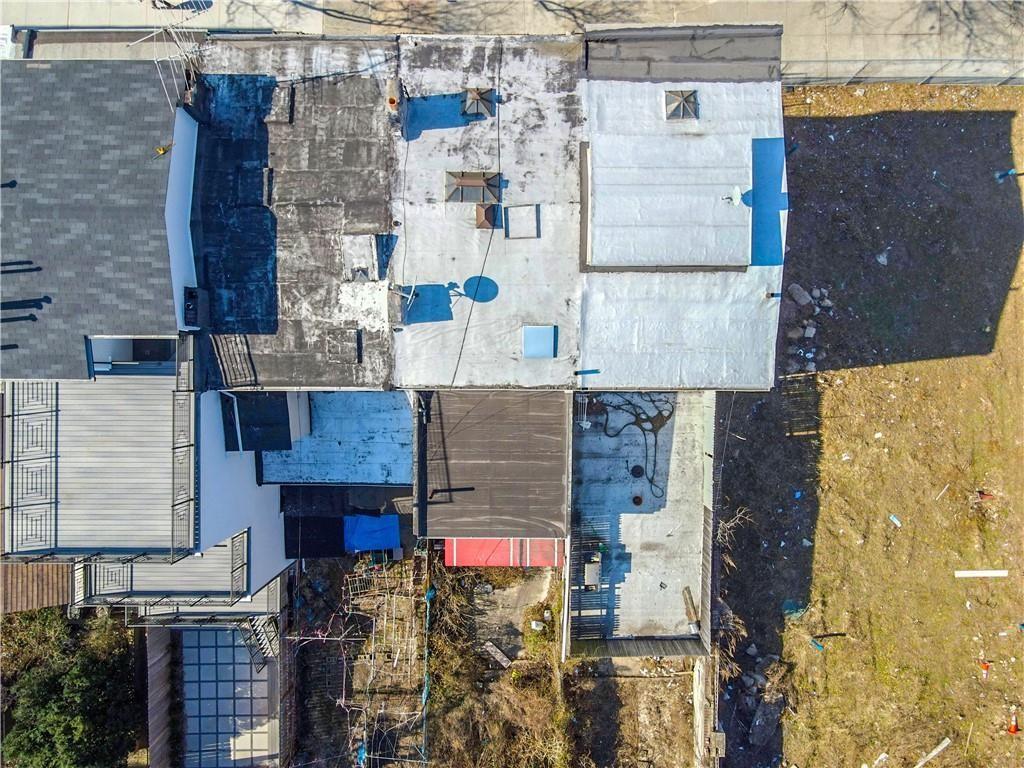 491 4th Avenue Brooklyn, NY 11215 - Photo 4 of 8 an aerial view of residential houses with outdoor space