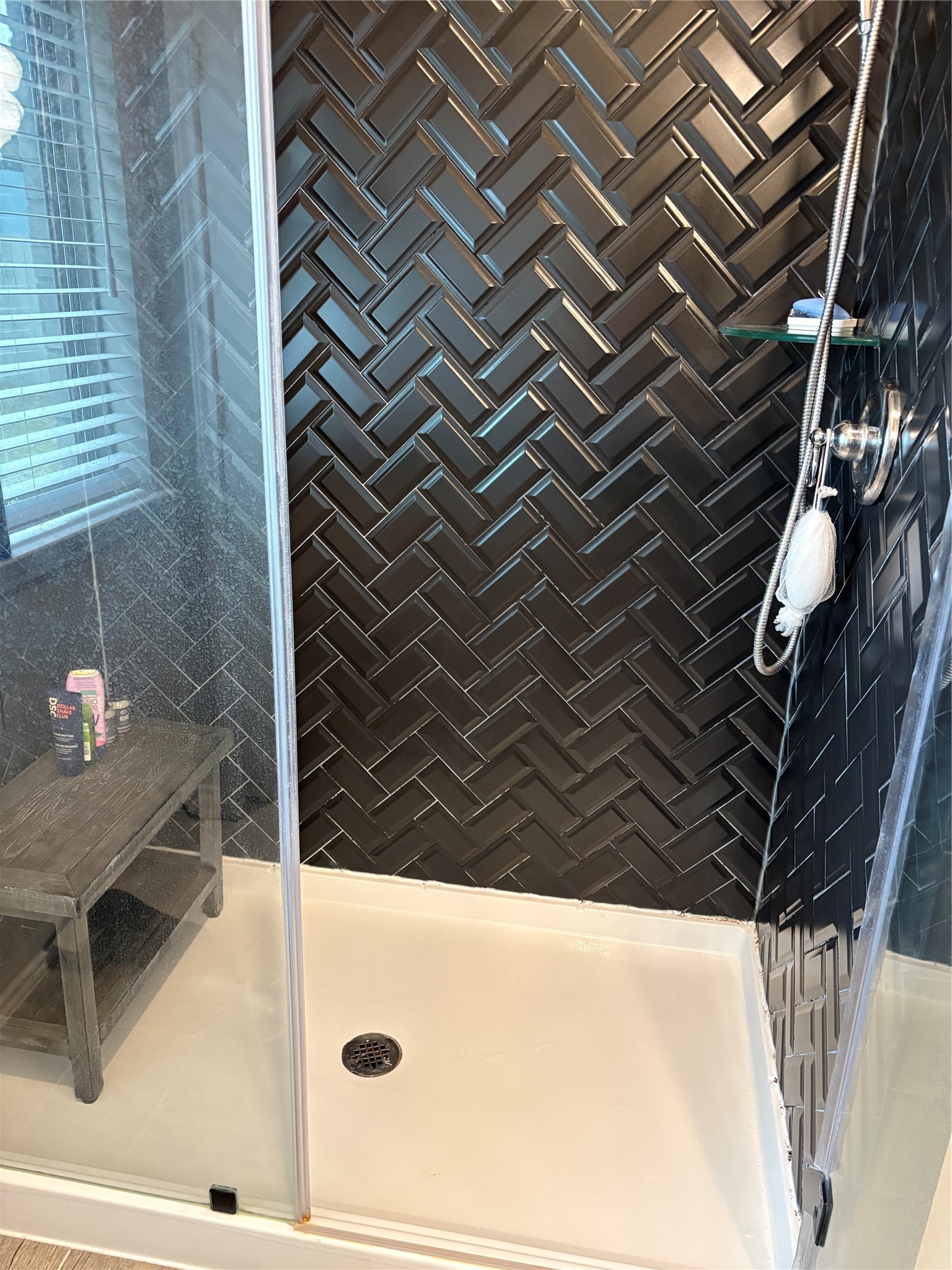 4503 Cedar Butte Lane Manvel, TX 77578 - Photo 12 of 16 Nice glossy black herringbone tile.