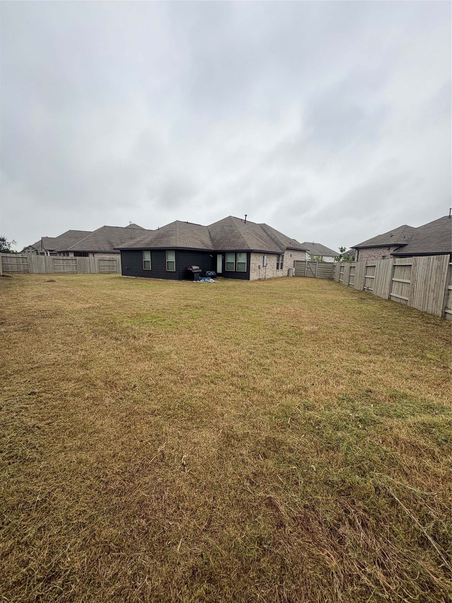 4503 Cedar Butte Lane Manvel, TX 77578 - Photo 15 of 16 Spacious backyard ready for your landscape design, outdoor retreat or entertaining space.