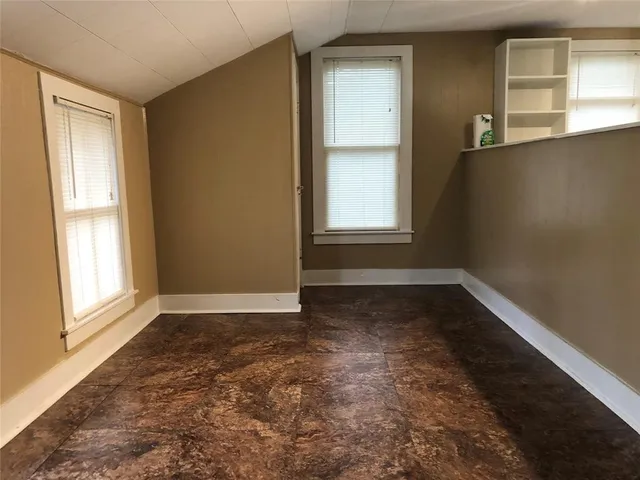 an empty room with a window