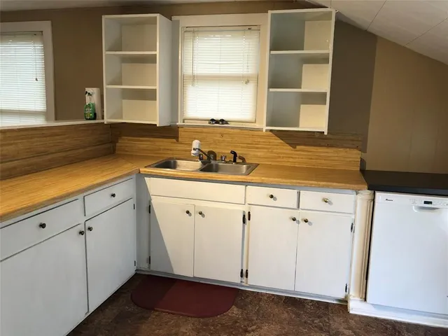 a view of a kitchen with a sink