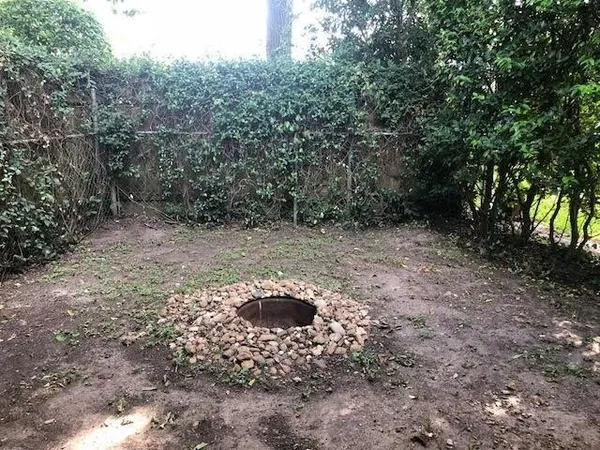 a bench sitting in front of a house