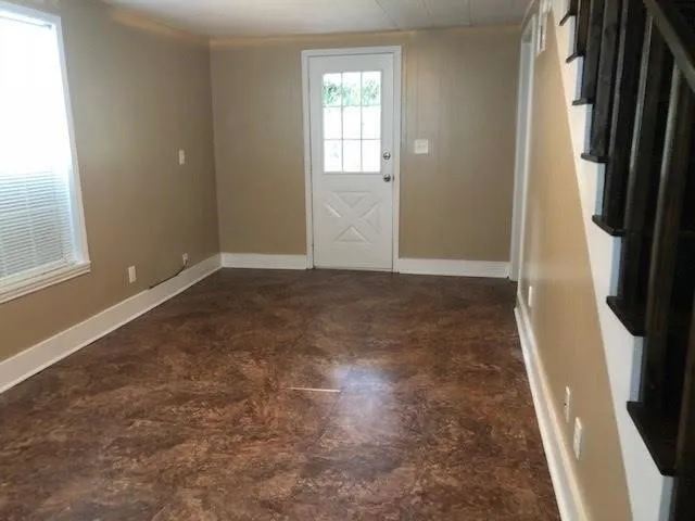 an empty room with windows