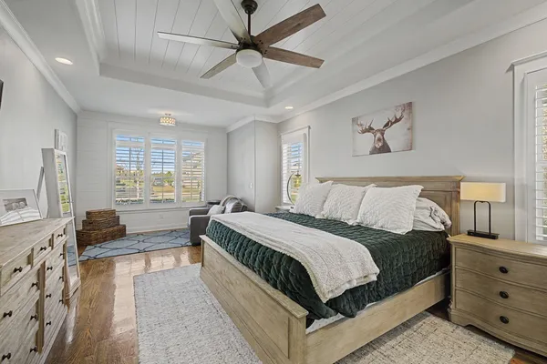 a bedroom with furniture and a fireplace
