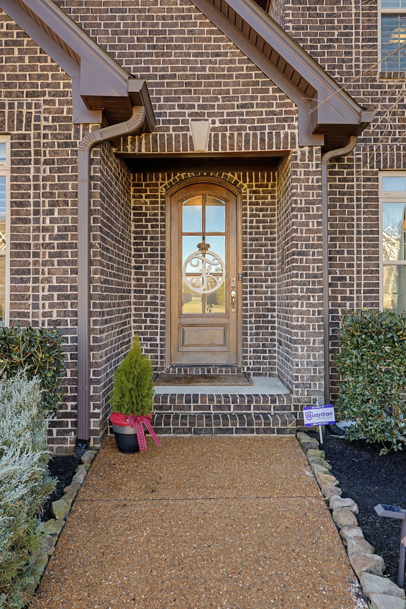 2965 Stewart Campbell Pointe Spring Hill, TN 37174 - Photo 2 of 48 a front view of a house with a garage