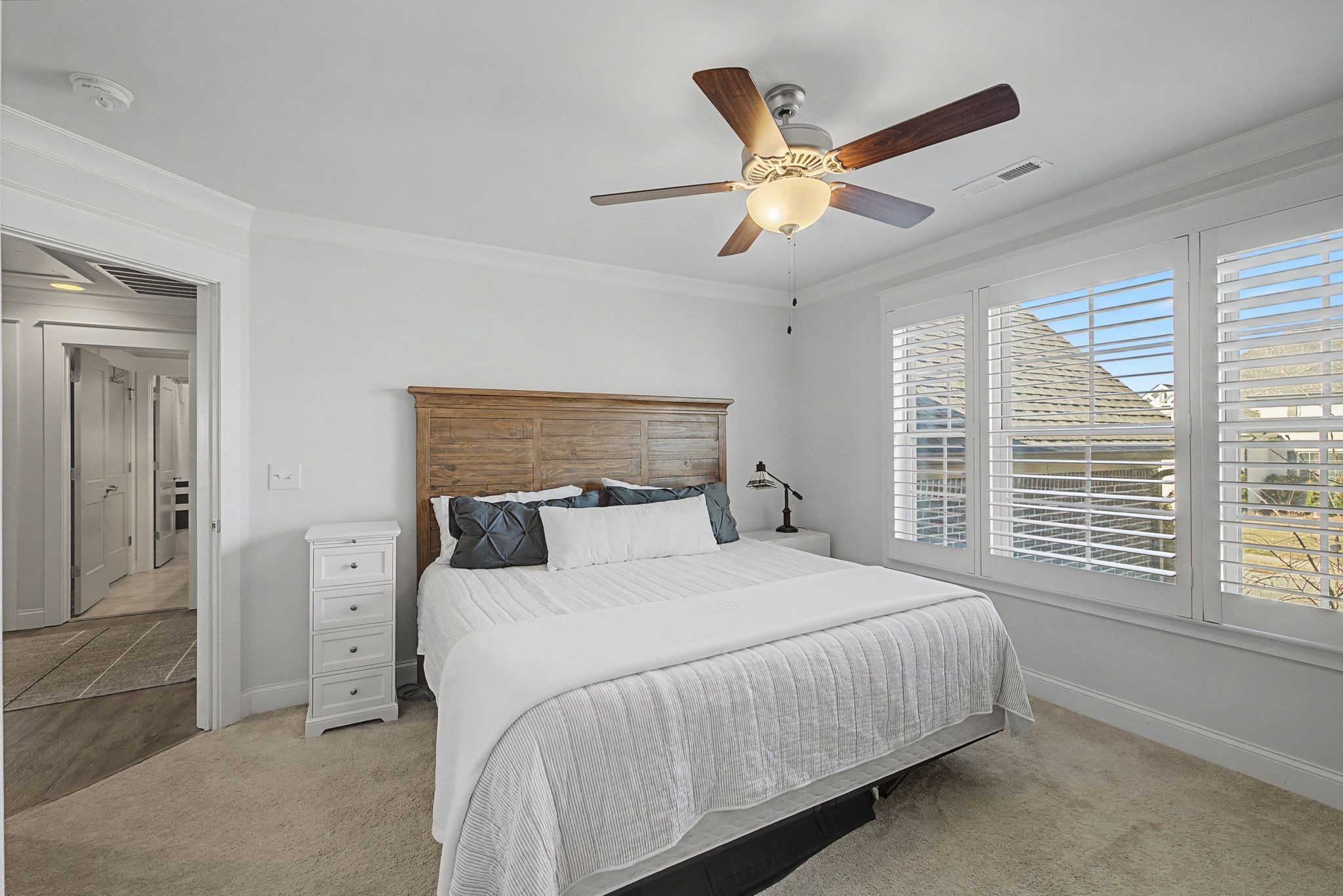 2965 Stewart Campbell Pointe Spring Hill, TN 37174 - Photo 33 of 48 a bedroom with a large bed and a large window