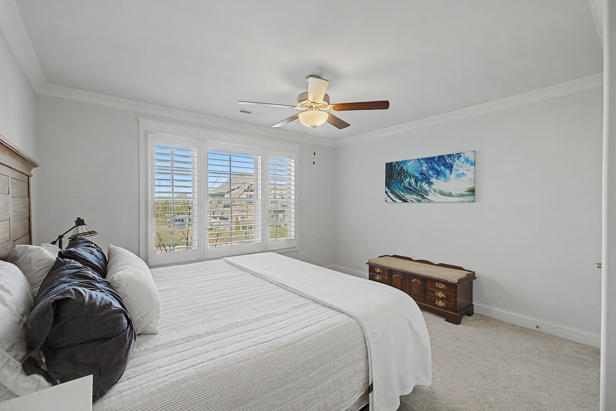 2965 Stewart Campbell Pointe Spring Hill, TN 37174 - Photo 34 of 48 a bedroom with a bed and a chandelier