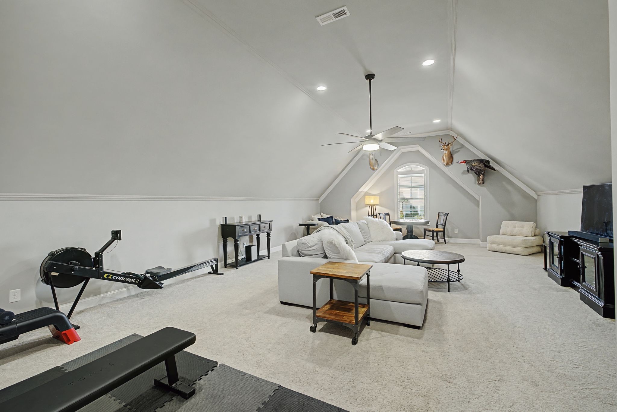 2965 Stewart Campbell Pointe Spring Hill, TN 37174 - Photo 36 of 48 a living room with furniture gym equipment and a view of living room