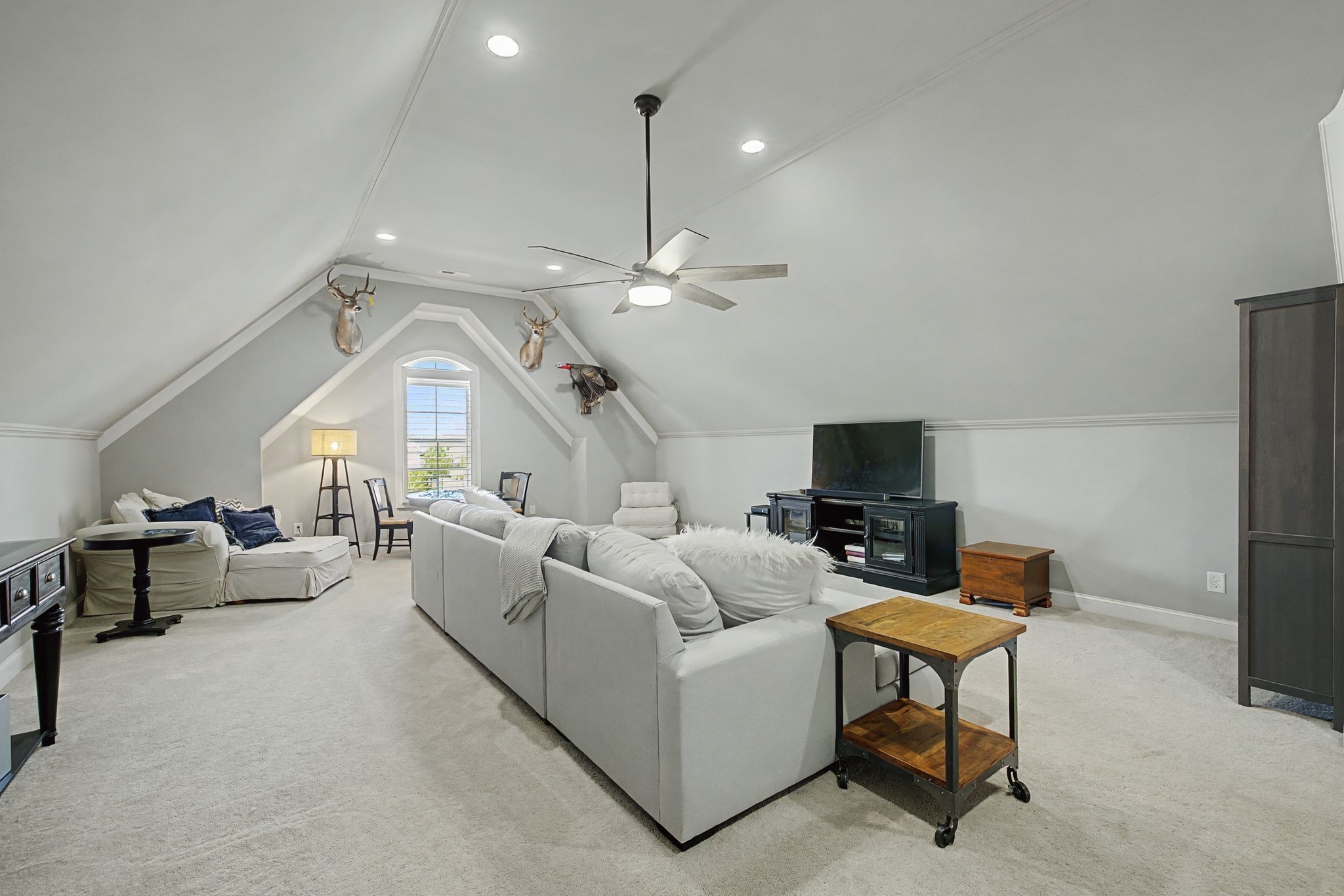 2965 Stewart Campbell Pointe Spring Hill, TN 37174 - Photo 37 of 48 a living room with furniture and a flat screen tv